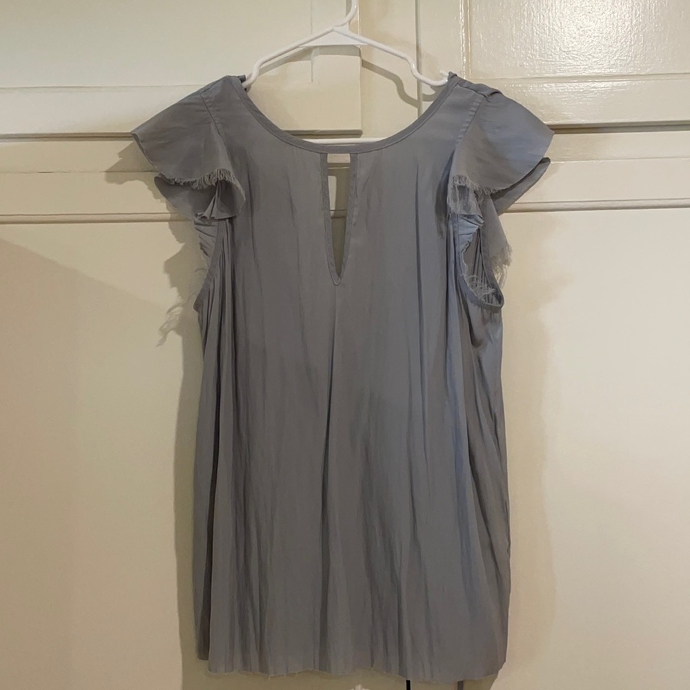 Calvin Rucker dusty blue open back blouse